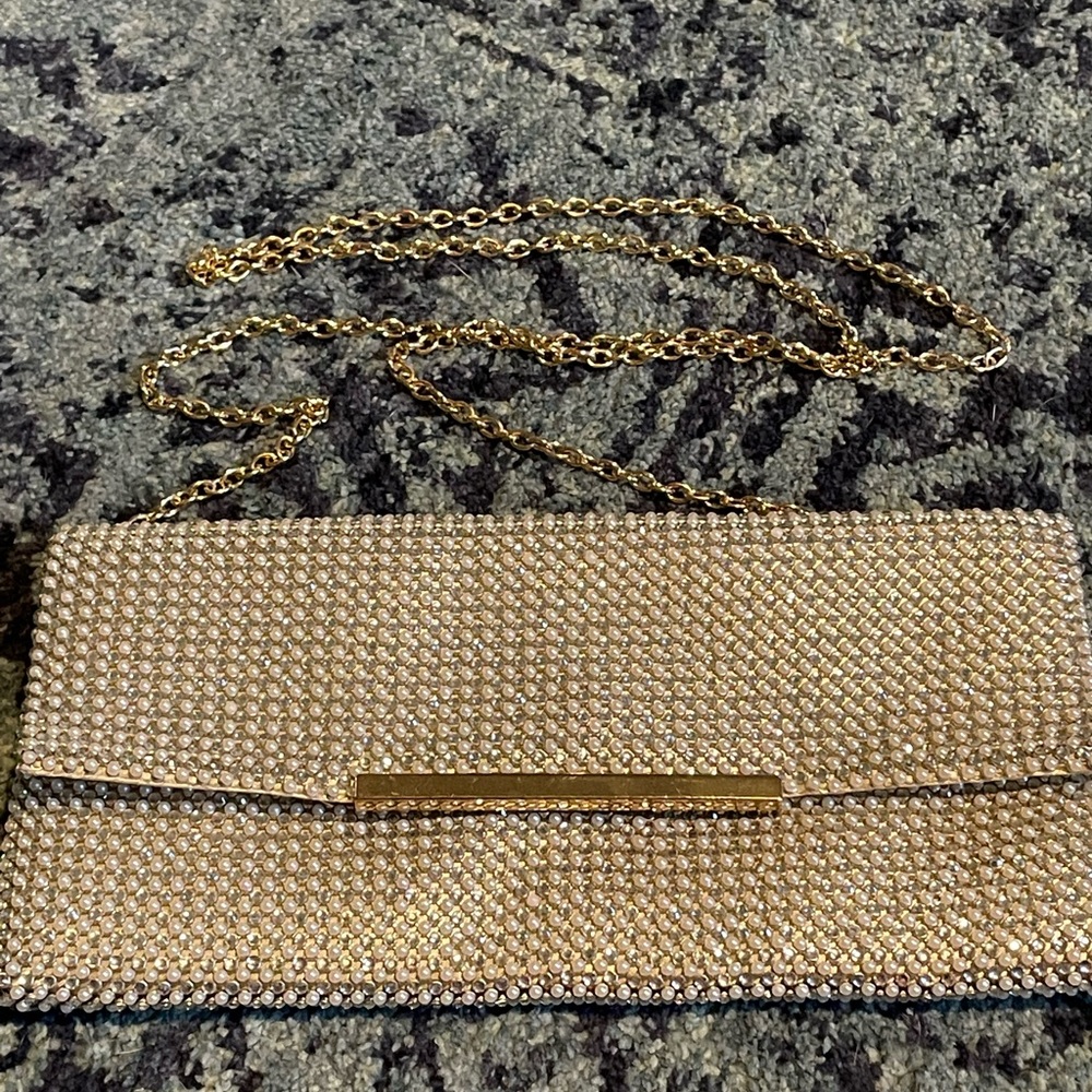 Silver dazzle clutch w/ gold chain! Used for wedding day only. Great condition!